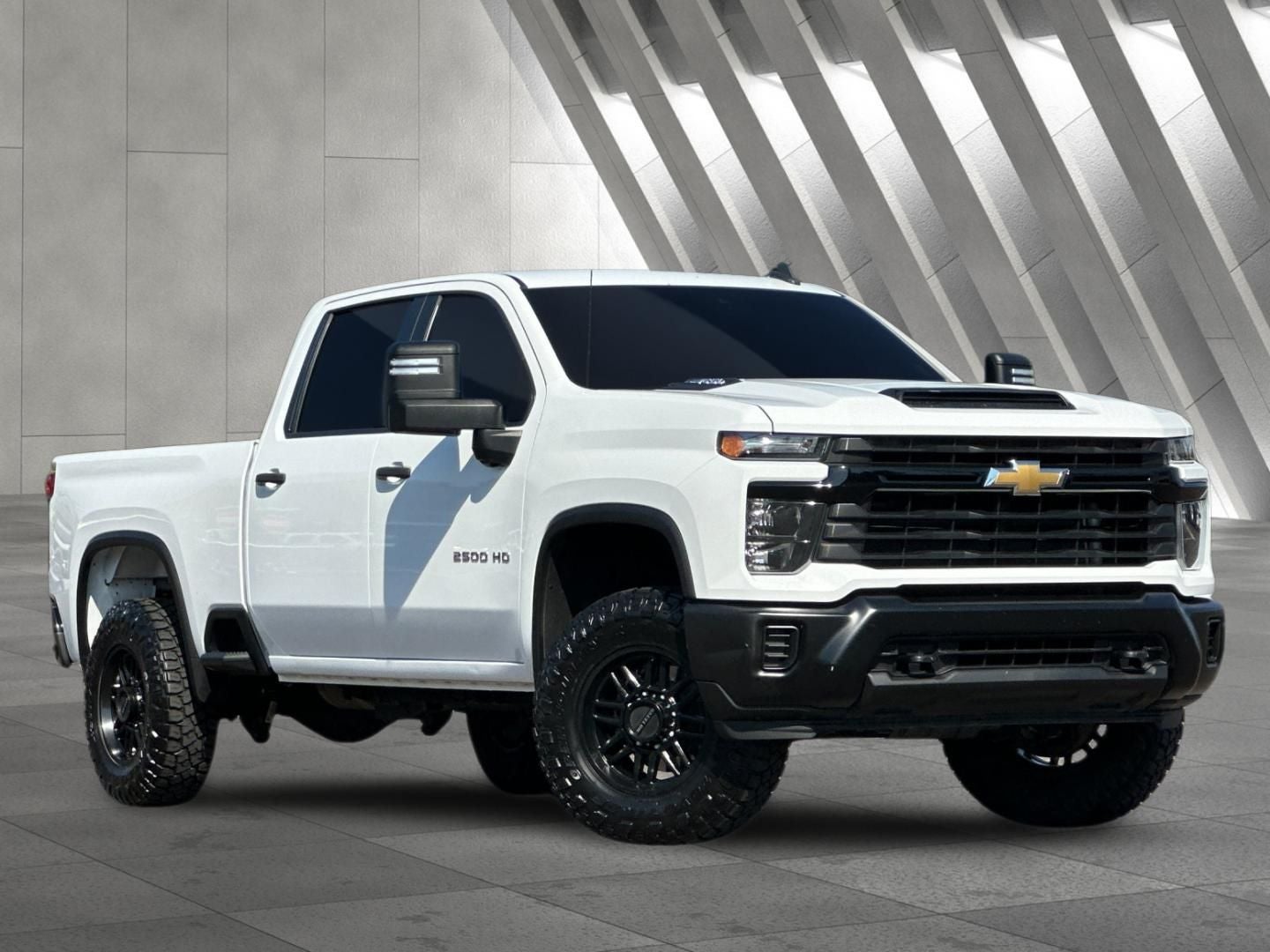 2024 Chevrolet Silverado 2500HD Work Truck in Summit White — front three-quarter view