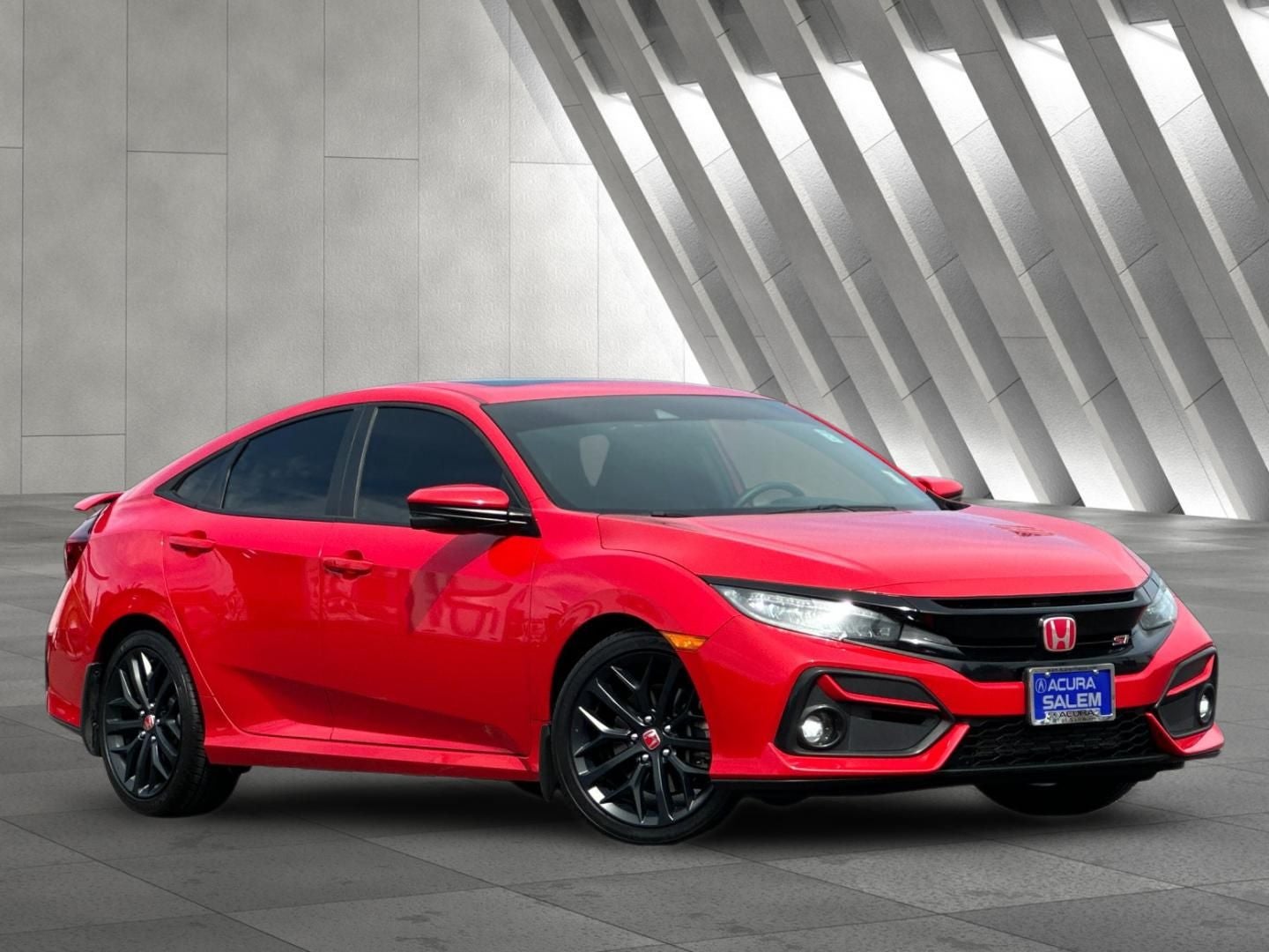 2020 Honda Civic Si in Rallye Red — front three-quarter view