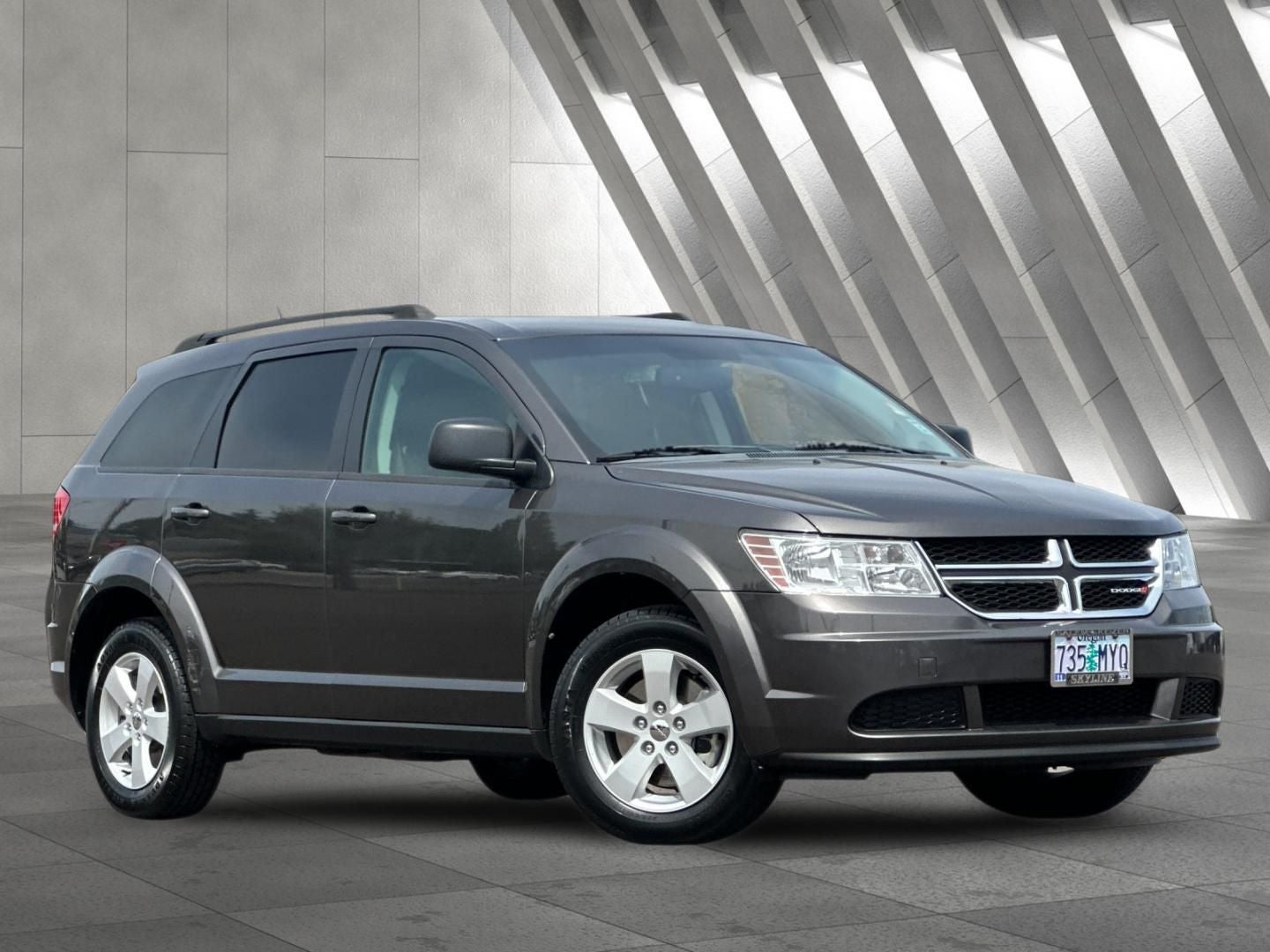 2017 Dodge Journey SE in Granite Pearlcoat — front three-quarter view