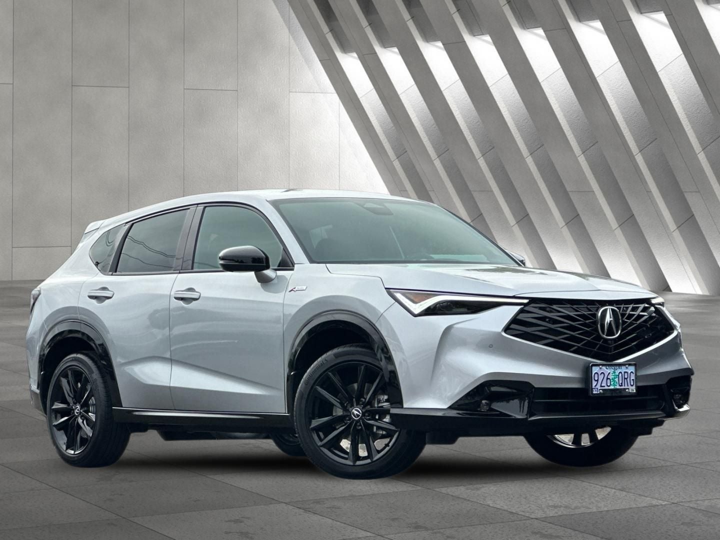2025 Acura ADX A-Spec Advance Package in Solar Silver Metallic — front three-quarter view