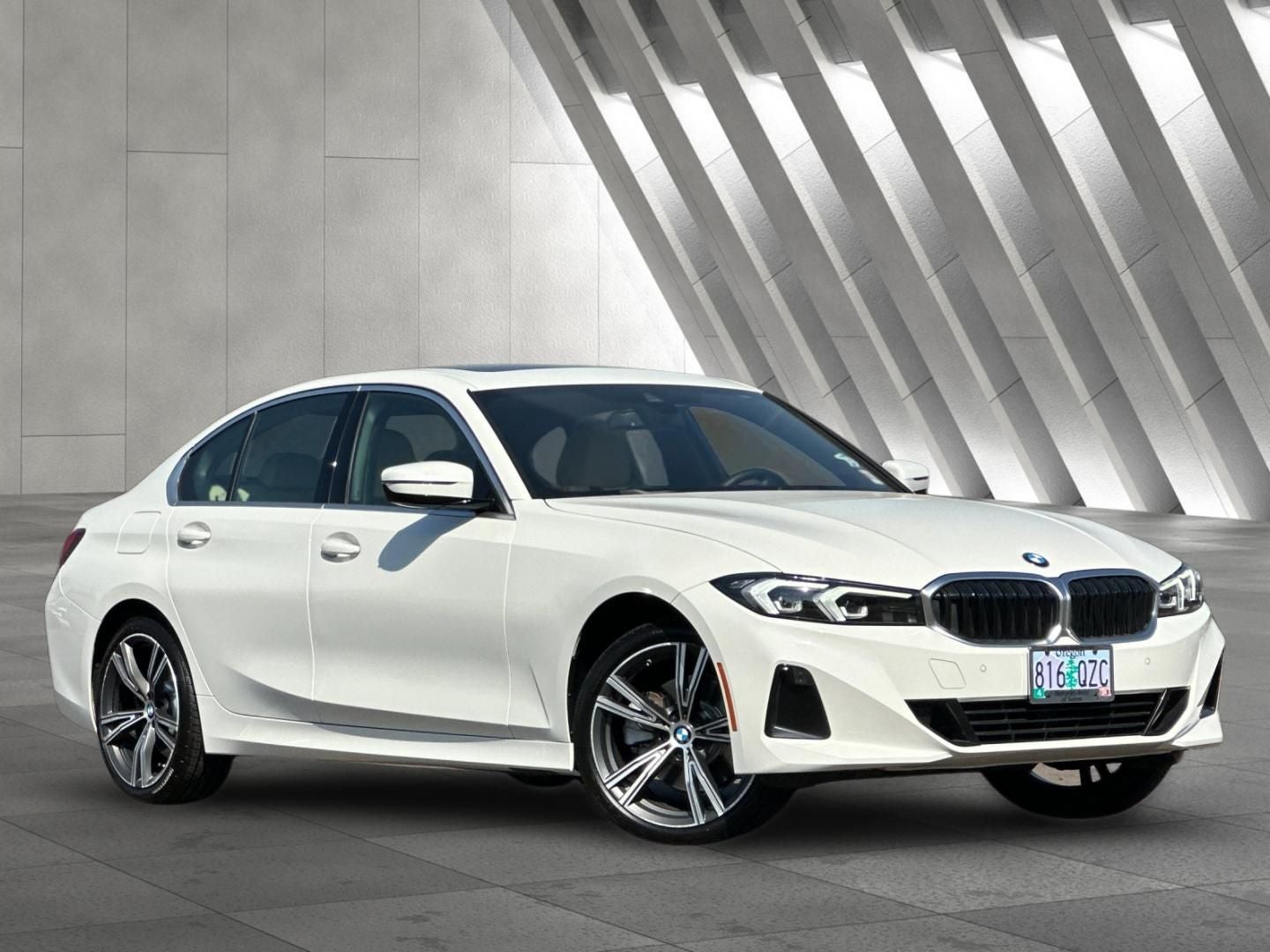 2024 BMW 3 Series 330i xDrive in Alpine White — front three-quarter view