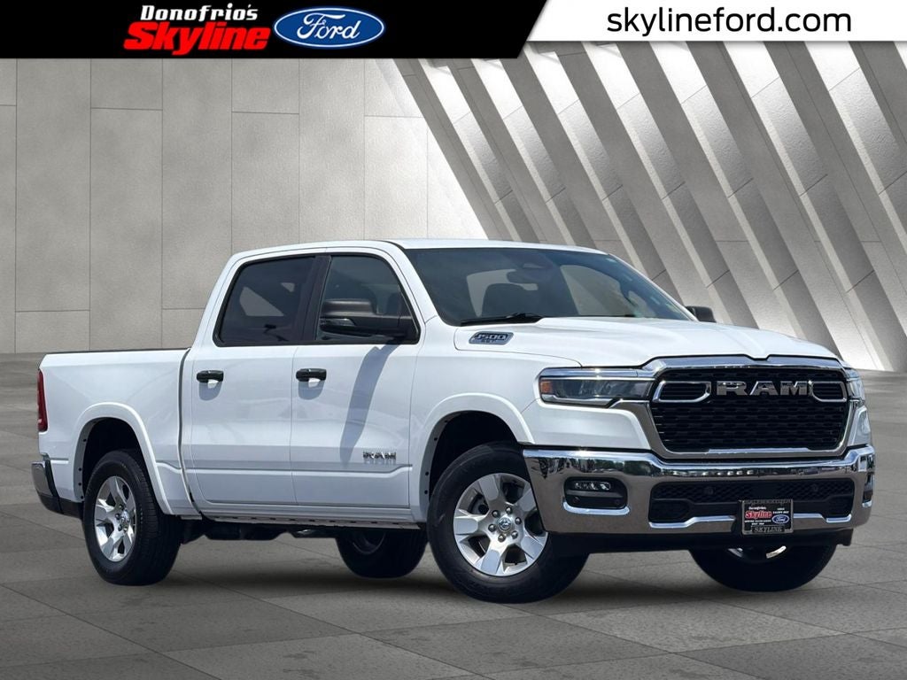 2025 RAM 1500 Big Horn/Lone Star in Bright White Clearcoat — front three-quarter view