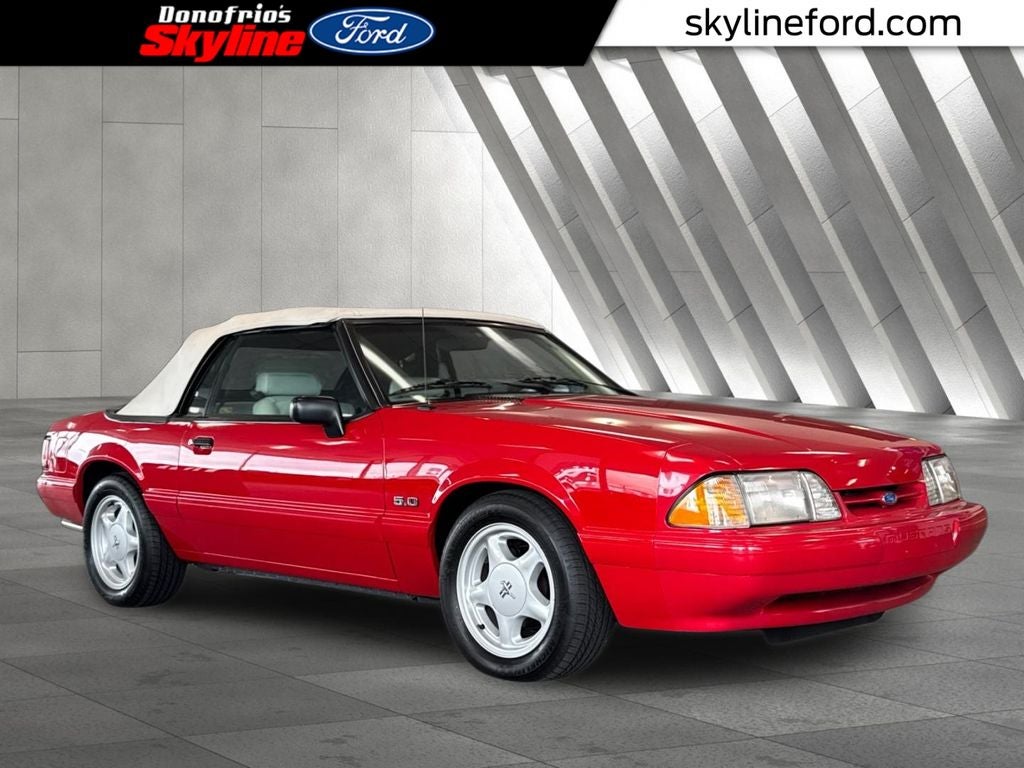 1993 Ford Mustang LX in Red — front three-quarter view