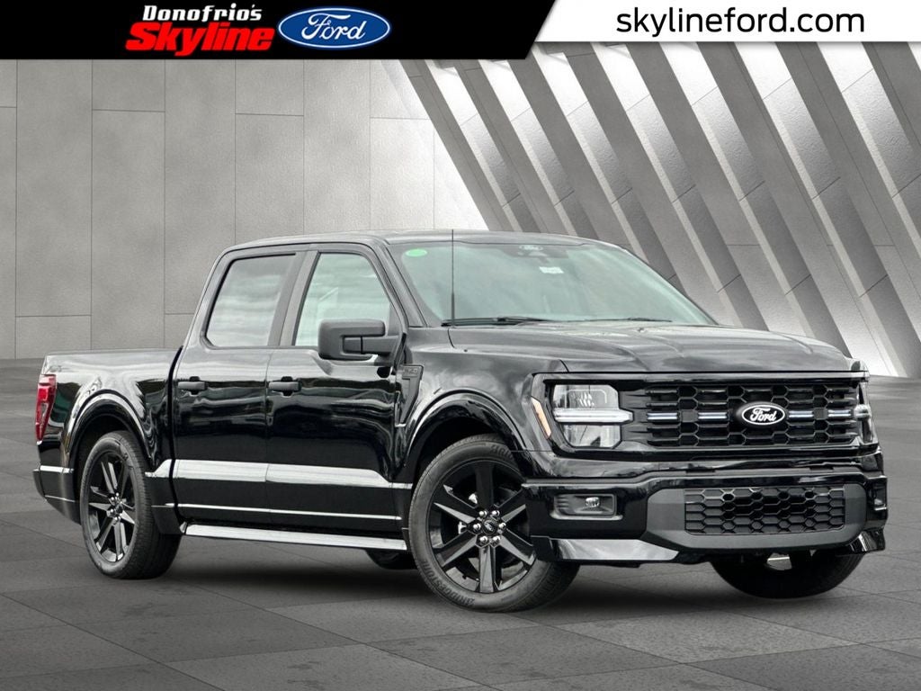 2025 Ford F-150 STX in Agate Black Metallic — front three-quarter view