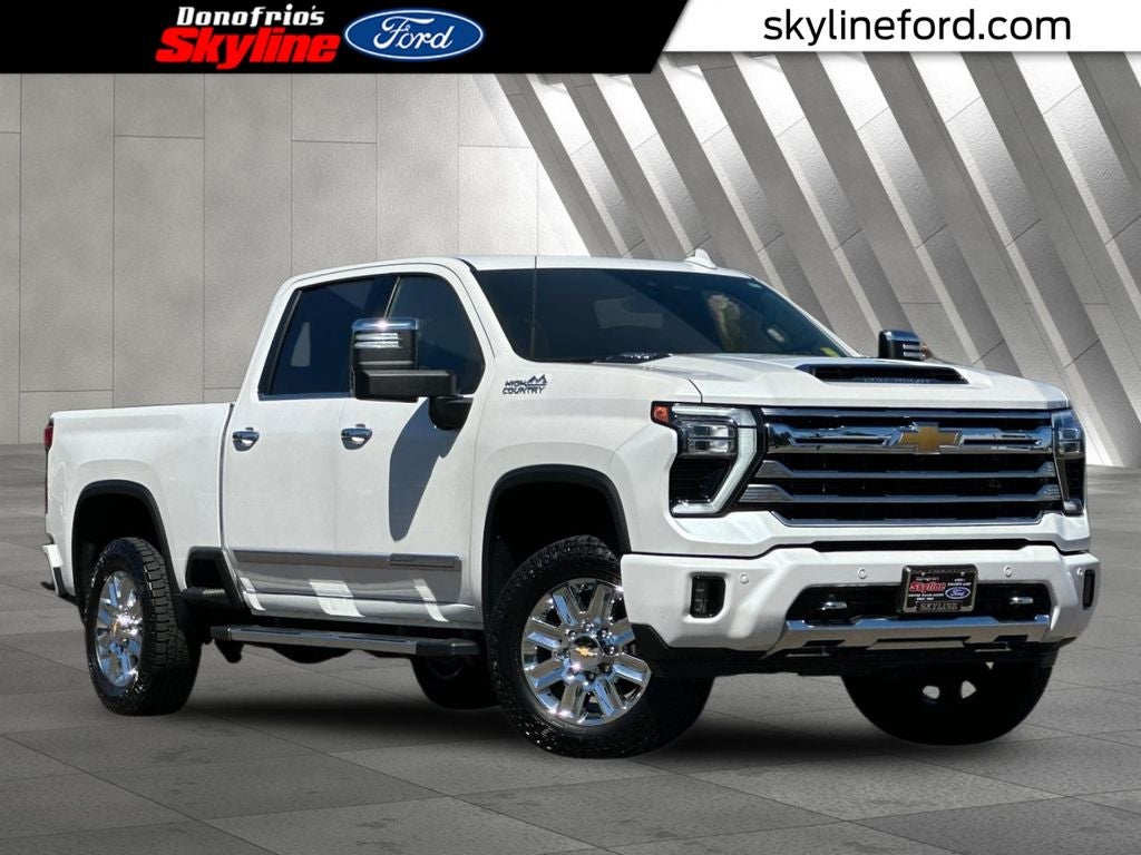 2024 Chevrolet Silverado 2500HD High Country in Iridescent Pearl Tricoat — front three-quarter view