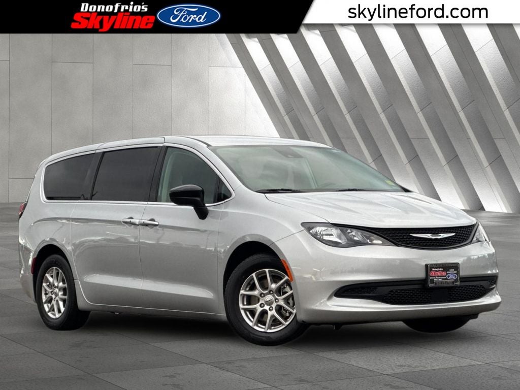 2024 Chrysler Voyager LX in Silver Mist Clearcoat — front three-quarter view